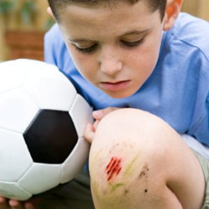 Причины болей в колене