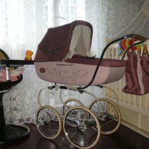 Оптимальный вариант детской коляски Коляска, совмещающая в себе множество функций